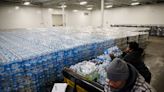 When communities face drinking-water crises, bottled water is a 'temporary' solution that often lasts years − and worsens inequality