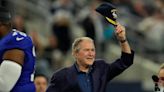 How did George W. Bush flub the coin toss in the Dallas Cowboys game against the Giants