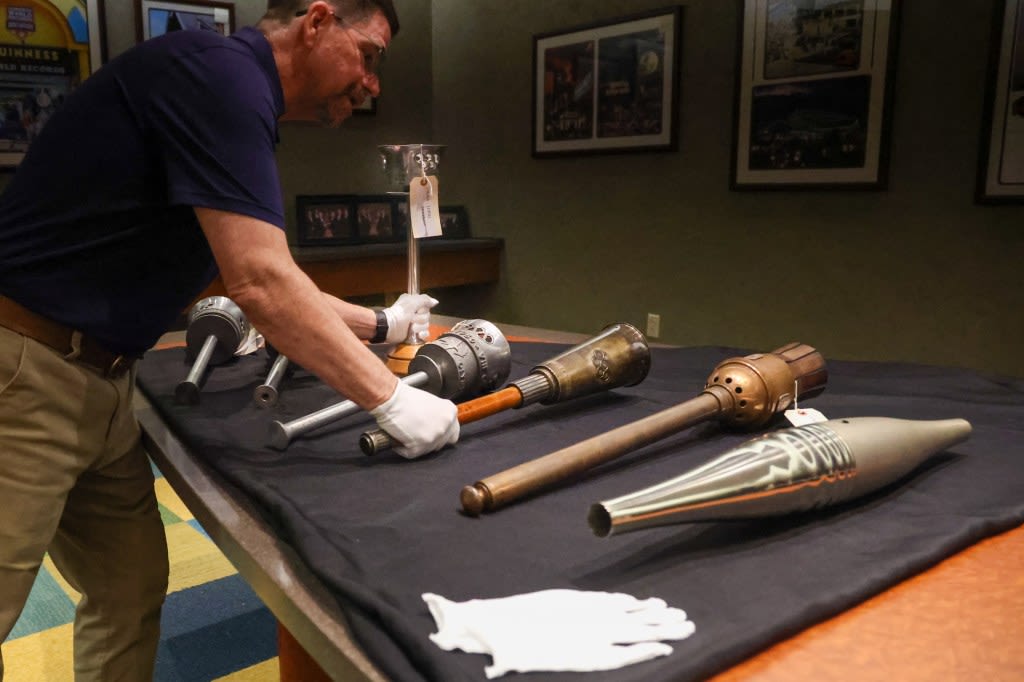 Hot property: Rare buys expand Ripley’s Olympic torch collection