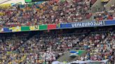 Ukraine supporters unfurl huge mosaic of football-loving soldiers