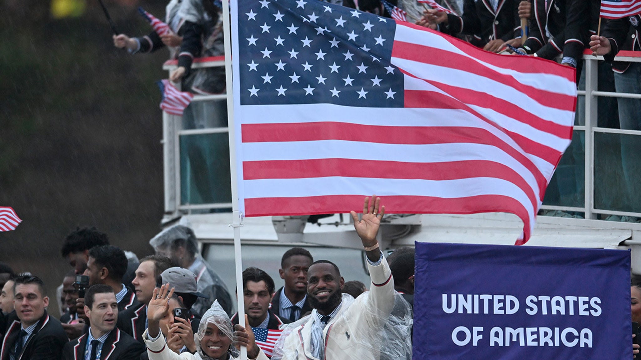 LeBron James, Coco Gauff Hoist American Flag on Team USA Boat At Olympics