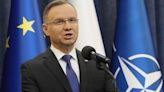 Poland’s leader says his country is ready to host NATO members’ nuclear weapons to counter Russia