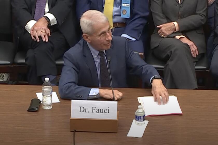 Column: Anatomy of a smear — Fauci faces the House GOP's clown show about COVID