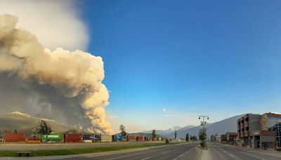 Alberta premier fights back tears as wildfire devastates iconic Jasper