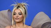 Bebe Rexha Soaks Up the Sun in Singapore in Little Black Swimsuit