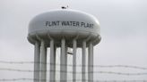 Michigan judge drops charges against 7 ex-state and city officials in Flint water crisis