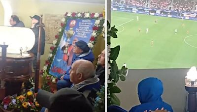 Viral video: Family pauses funeral service, watches football on TV sitting next to coffin