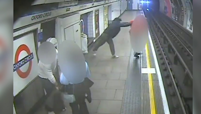 Man accused of pushing postman on Tube tracks did not intend to kill, trial told