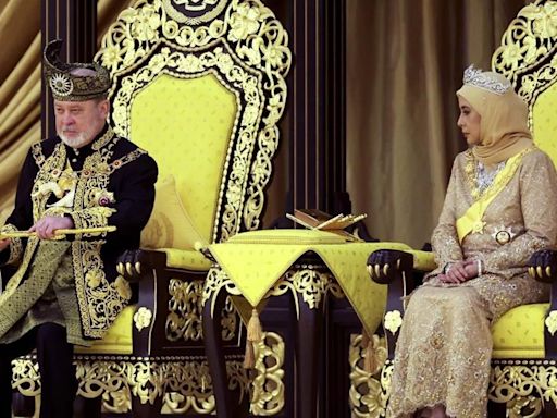 Malaysia honors a new king in coronation marked by pomp and cannon fire