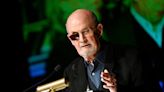 What is a fatwa and why did Iran issue one against Salman Rushdie for The Satanic Verses in 1989?