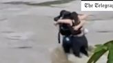 Three friends filmed in final embrace before being swept away by flash floods in Italy