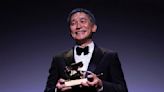 Tony Leung gets emotional accepting lifetime achievement award from Ang Lee at Venice Film Festival
