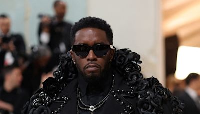 Diddy ate chocolate strawberries off naked woman at high-profile Miami party attended by Will Smith, Bruce Willis