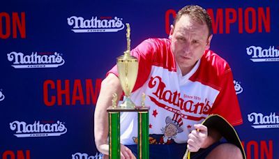 Joey Chestnut shows no rust as he downs 57 hot dogs in competition at Fort Bliss