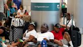 Holiday getaway pushes US airport traffic to pandemic high