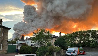 Huge plume of smoke as firefighters tackle industrial estate blaze