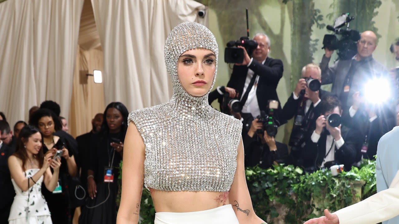 Cara Delevingne Shines Bright With a Jeweled Body Armor and Soft Glam at the Met Gala