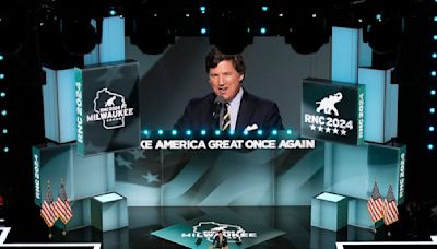 15 months after his firing, Tucker Carlson returns to Fox News airwaves with a GOP convention speech