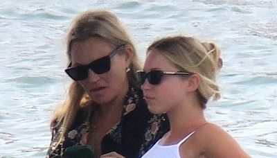 Kate Moss takes a water taxi to Ibiza with lookalike daughter Lila