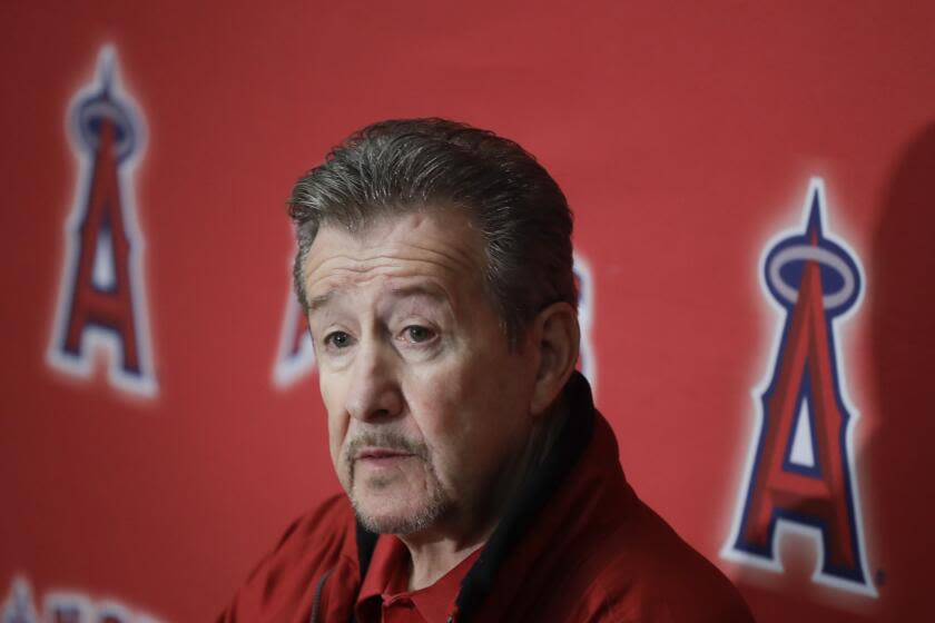 Anaheim owes Angels owner Arte Moreno $5 million. Why hasn't the city paid?