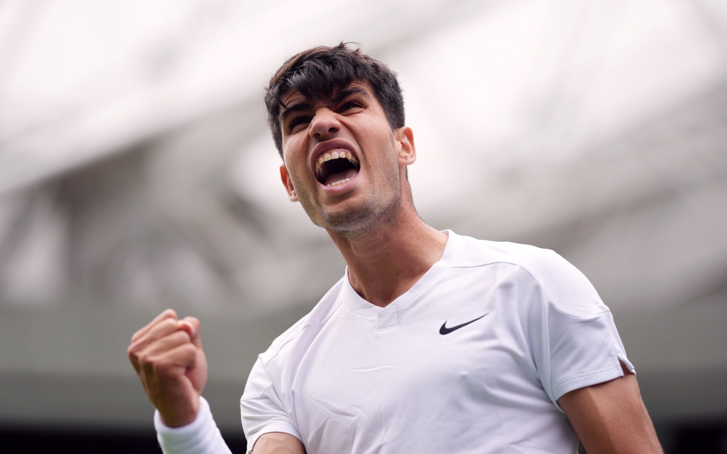 Carlos Alcaraz dazzles on Centre Court to start Wimbledon defence with a win