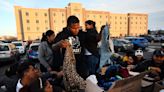 Denver to cut funds for police, city agencies to address migrant influx