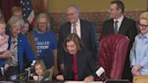 Gov. Reynolds signs cancer bills into law