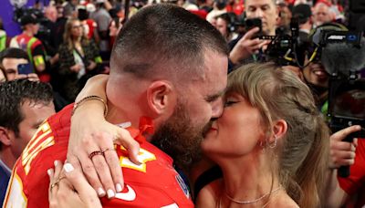 Viral video sees Travis Kelce planting kisses on Taylor Swift’s arm