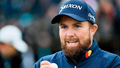 Lowry takes British Open lead, Woods, McIlroy in tough spot