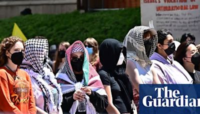 Why are pro-Palestinian US student protesters wearing masks on campus?