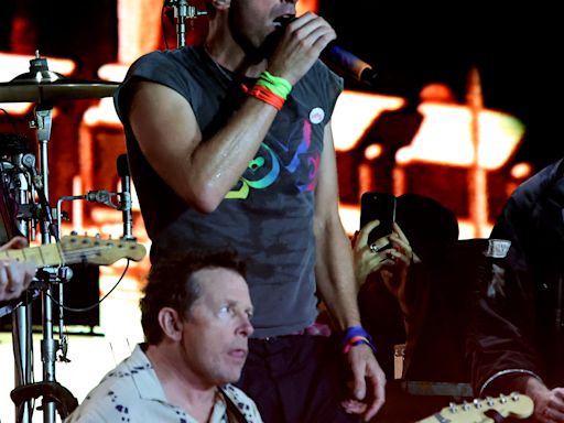 Coldplay Brings Michael J. Fox on Stage at Glastonbury to Perform ‘Humankind’ and ‘Fix You’