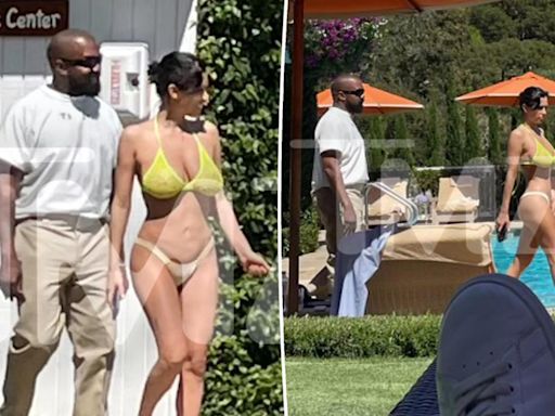 Bianca Censori steps out in a tiny bikini as Kanye West remains fully dressed at luxurious hotel outing in California