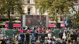 Crowds gather in silent tribute to Queen in Belfast to watch state funeral