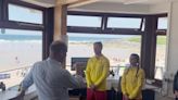 William plays volleyball during visit to Cornwall beach