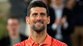 Novak Djokovic keeps focus on court to see off Marton Fucsovics at French Open