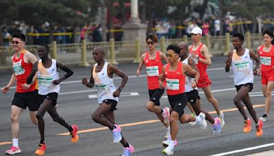 Beijing half marathon results under investigation after runners appear to hand win to Chinese star