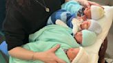 'Life is going to be noisier': Scottish couple welcome rare quadruplets | ITV News