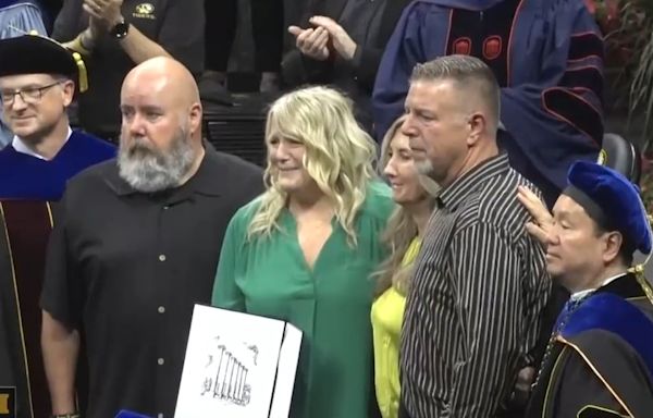Riley Strain’s parents accept his diploma in tears at Mizzou’s graduation ceremony
