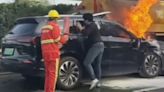 Dramatic moment motorists try to rescue family from burning EV before 3 killed