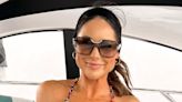 Louis Thompson displays her stoma bag in a bikini on a boat day