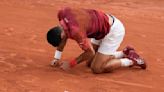 Novak Djokovic's French Open title defense ends because of an injured knee