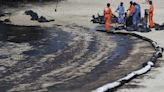 Singapore closes public beach as it intensifies oil spill clean up