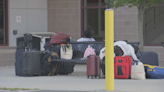 Migrant families at train station in Quincy seeking shelter