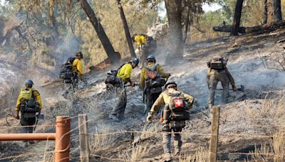 Fire Crews mopping up near Neverland Ranch and Midland School that was burned by Lake Fire on Figueroa Mountain Rd in Santa Ynez, California...