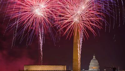 Fireworks light up the skies across the US as Americans endure searing heat to celebrate July Fourth