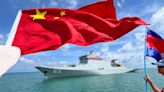 China promises 'friendship' as two warships dock in Cambodia