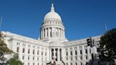 Man faces misdemeanor charge for twice bringing guns to Wisconsin Capitol, demanding to see governor