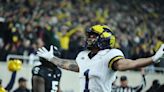 Michigan football players 'chilling' in the latest storm, waiting for it to pass