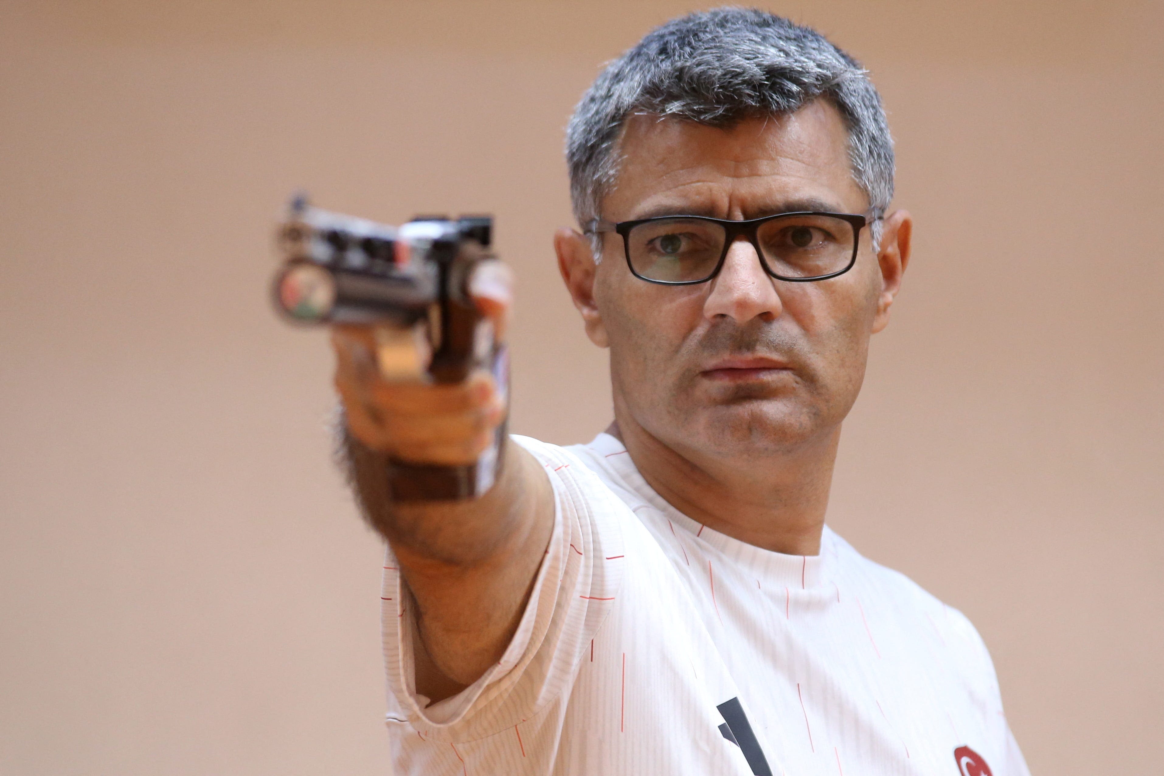 The hottest Olympic celebration is Turkish pistol shooter Yusuf Dikec's iconic one-arm pose