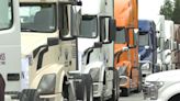B.C. port truckers protest licensing changes in rolling convoy